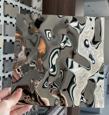 ألواح جدارية من الفولاذ المقاوم للصدأ بتصميم تموجات الماء العاكسة: ألواح جدارية مطروقة ثلاثية الأبعاد